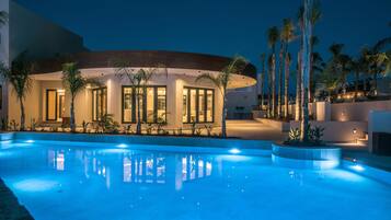 Seasonal outdoor pool, pool umbrellas, pool loungers