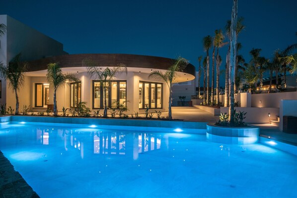 Seasonal outdoor pool, pool umbrellas, pool loungers