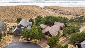 A coastal residential area with houses surrounded by dunes and a beach. - Fantastic Single Level Shorepines Village Home, Steps From Beach and Ocean, 1/4 Mile to Kiwanda (Cloverdale)