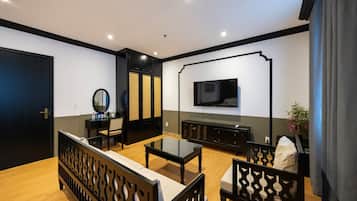 Family Room, Multiple Beds, City View | Premium bedding, down comforters, memory foam beds, minibar