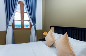 Chambre Double Deluxe, 1 très grand lit, vue plage | Vue sur la plage/l’océan