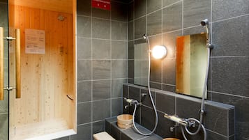 Combined shower/bathtub, deep-soaking bathtub, hair dryer, slippers