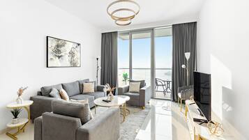 Luxury Apartment | Living area | 43-inch Smart TV with digital channels