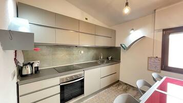 Casa Confort | Cocina privada | Trona infantil