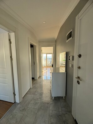 Loft panorâmico | Área de estar | TV de tela plana