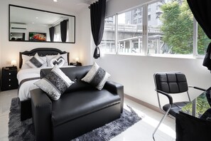 Deluxe kamer, 1 queensize bed, niet-roken, uitzicht op de stad | 1 slaapkamer, lakens van Egyptisch katoen, luxe beddengoed