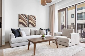 Apartamento City | Zona de estar | Una Smart TV
