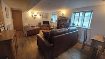 Ferienhaus | Wohnbereich | Fernseher