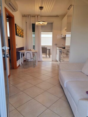 Apartamento, 1 quarto, sacada | Área de estar