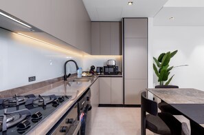 Private kitchen - Waves - Tranquil Waterfront Living 2B Retreat With Balcony (Dubai)