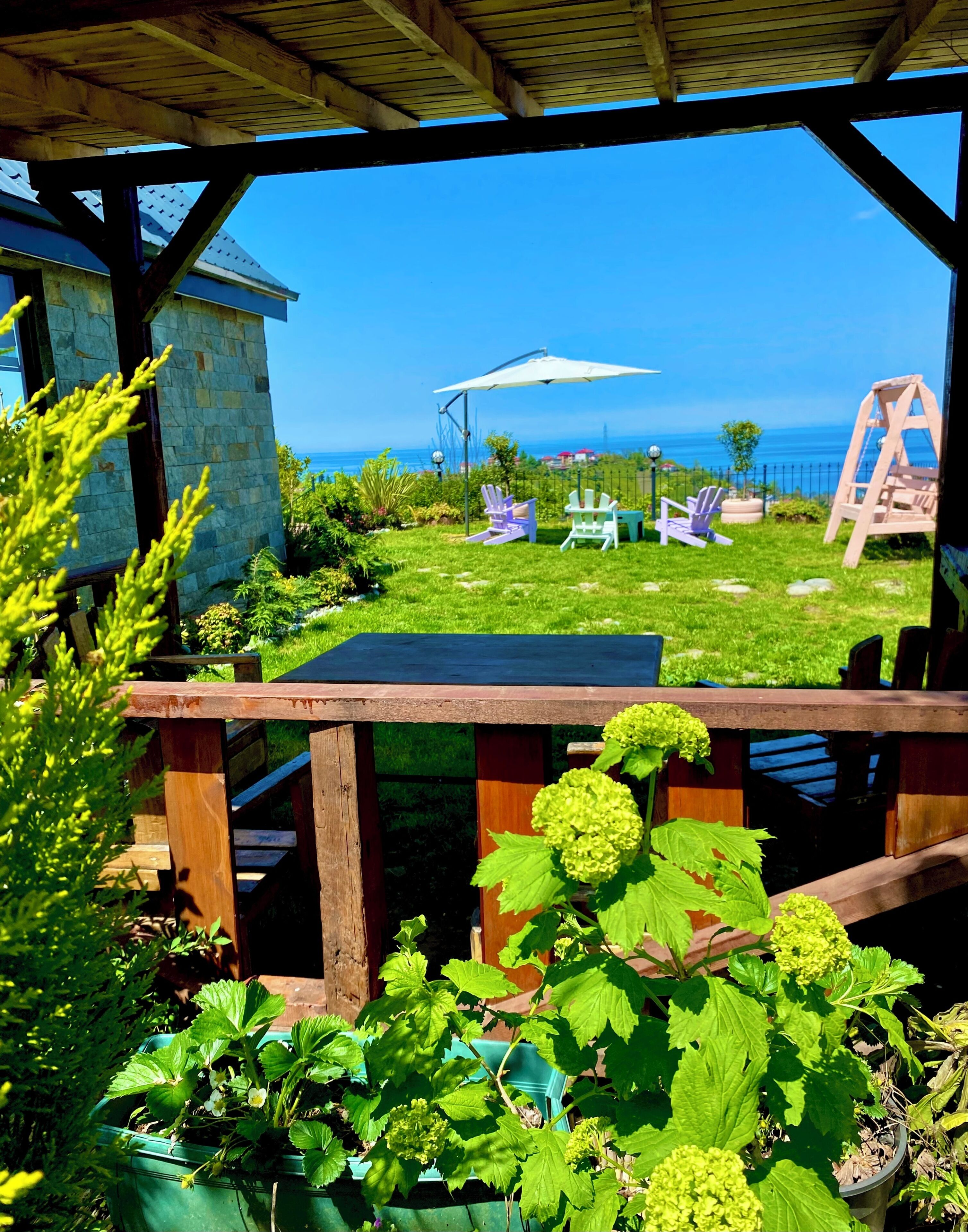 Bungalow familiar, varias camas, vista al mar, en el área del jardín | Terraza o patio