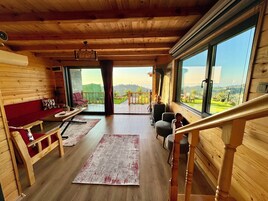 Family Bungalow, Multiple Beds, Sea View, Garden Area | Living area