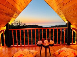 Deluxe Bungalow, Multiple Beds, Sea View, Garden Area | Balcony