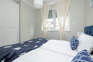 1 chambre, fer et planche à repasser, Wi-Fi, literie fournie