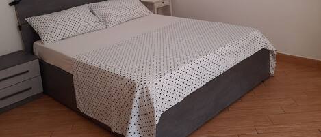 1 bedroom, desk, iron/ironing board, travel cot