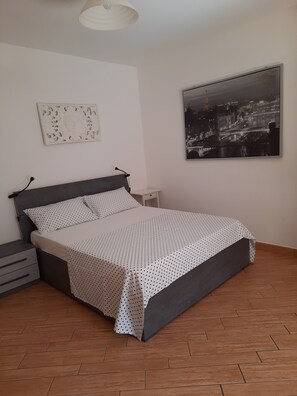 1 bedroom, desk, iron/ironing board, travel crib