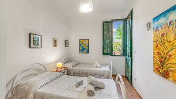 Family House, Multiple Bedrooms (Villetta Tamari 300 meters from the) | 2 bedrooms, free WiFi, bed sheets