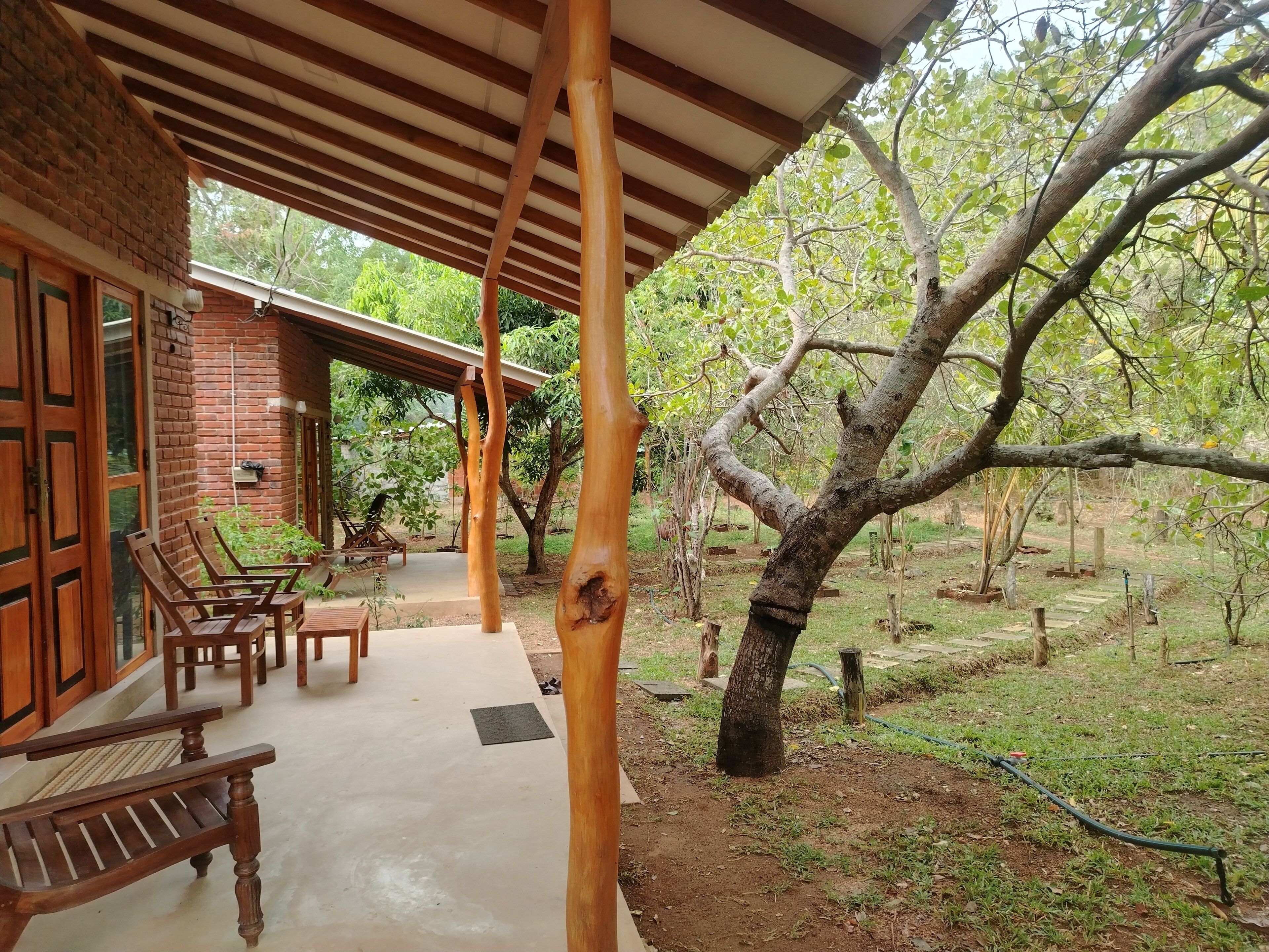 Deluxe Quadruple Room, Garden View | Premium bedding, down comforters, free minibar items