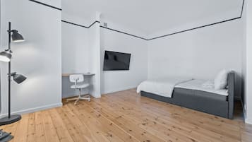 Suíte estúdio conforto | Área de estar | TV de tela plana 37 polegadas com canais digitais