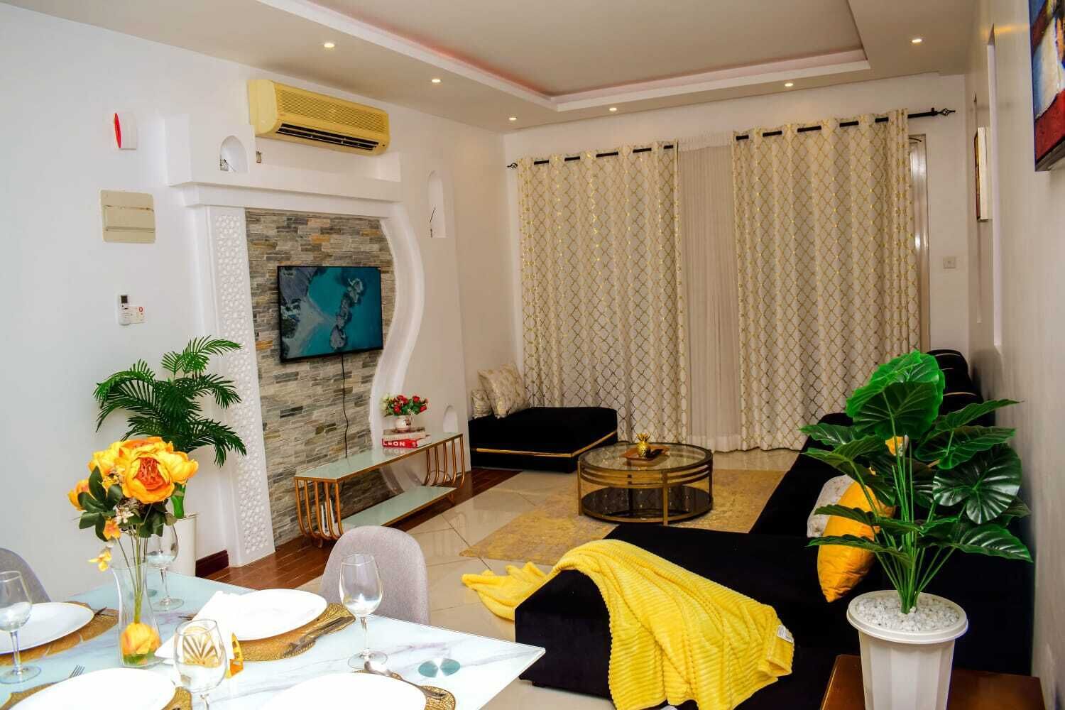 Comfort Apartment | Living area | 24-inch Smart TV with satellite channels