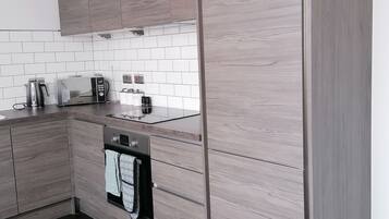 Apartment | Private kitchen | Fridge, microwave, oven, stovetop