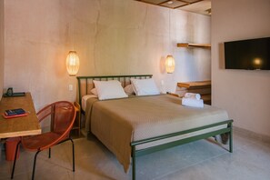 Premium Suite, Jetted Tub, Garden View | In-room safe, blackout drapes, soundproofing, bed sheets