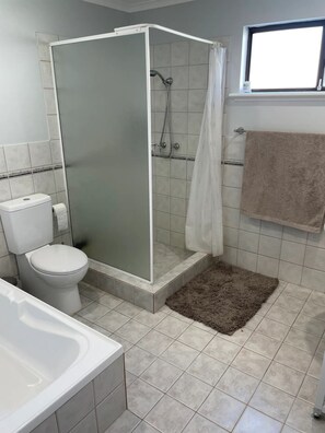 Shower, hair dryer, towels, soap