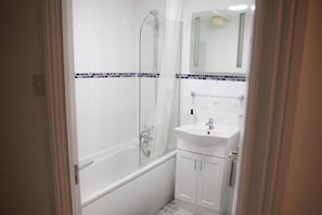 Apartment | Bathroom | Combined shower/tub, deep soaking tub, hair dryer, towels