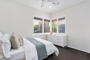 4 bedrooms, desk, iron/ironing board, travel cot