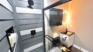 Shower, hair dryer, towels, soap