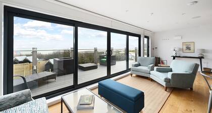 New apartment nestled on the seaside with expansive views of cliffs, sea and sky