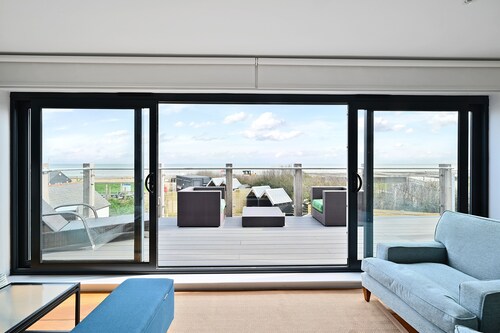 New apartment nestled on the seaside with expansive views of cliffs, sea and sky