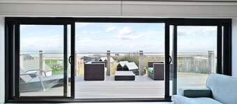 New apartment nestled on the seaside with expansive views of cliffs, sea and sky