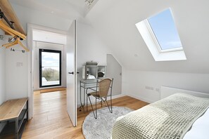 2 bedrooms, desk, iron/ironing board, travel cot