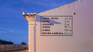 A sign with distances to various locations.