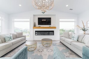 Smart TV, fireplace, books