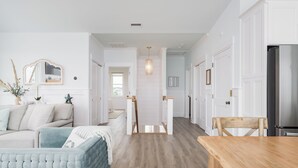 Living area - Beautiful 6 bedroom beach house with pool and elevator! Steps from the beach! (Oak Island)