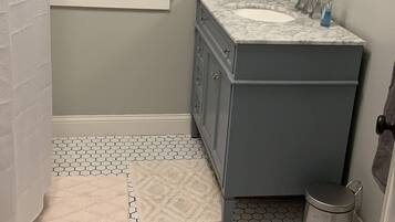 Hair dryer, towels, soap, shampoo