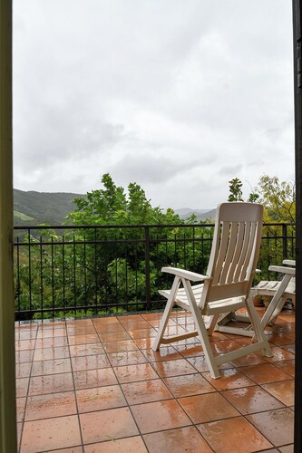 Renovated house with fireplace in Oltrepo Pavese, surrounded by nature.