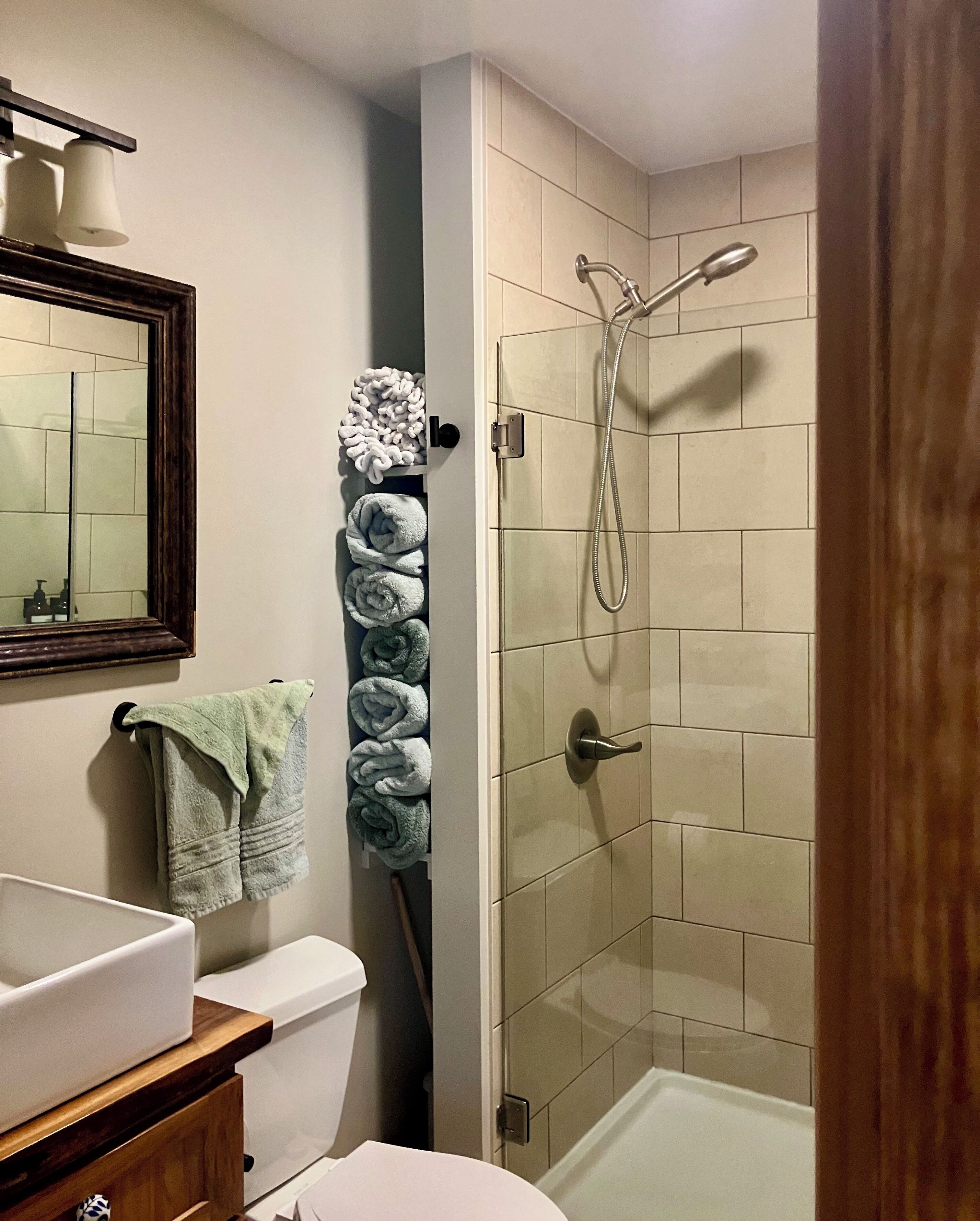 Shower, eco-friendly toiletries, hair dryer, towels
