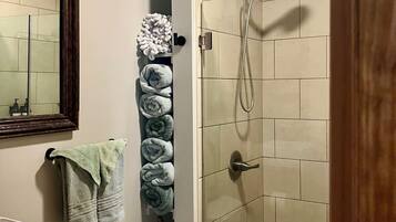 Shower, eco-friendly toiletries, hair dryer, towels