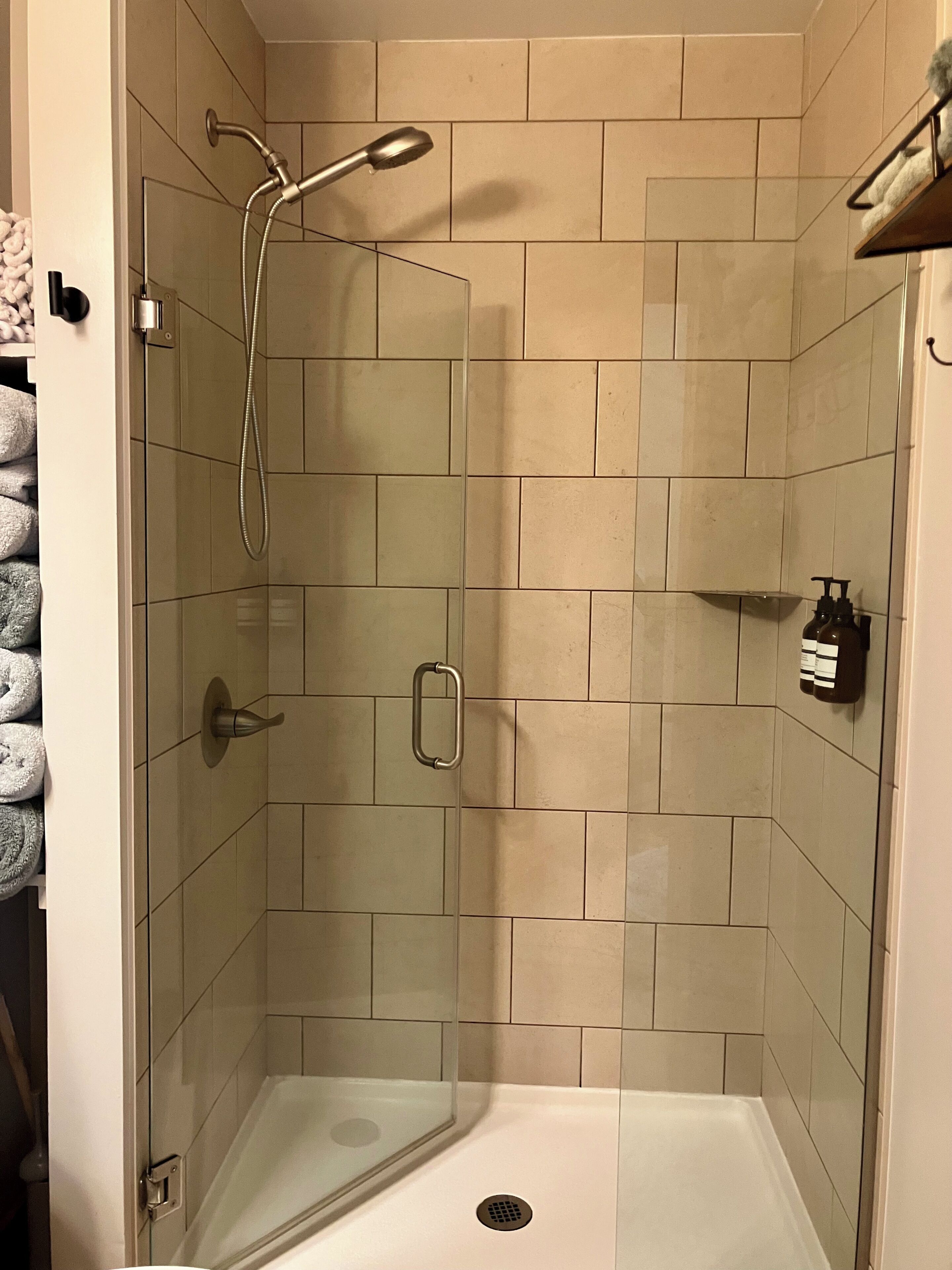 Shower, eco-friendly toiletries, hair dryer, towels
