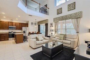 TV, books - Spacious, Family Friendly home with Pool, Spa & Games. Minutes from Disney! (Davenport)