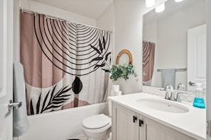 Hair dryer, towels, soap, toilet paper