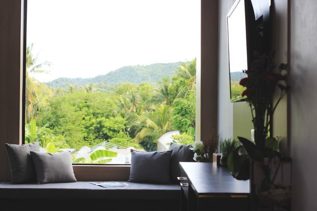 Kamar Double Deluks, Beberapa Tempat Tidur, lemari es, pemandangan taman | Didekorasi berbeda-beda dan dilengkapi dengan perabotan berbeda-beda