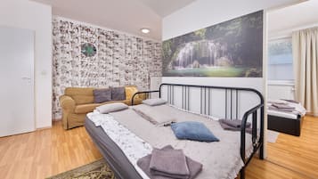 1 chambre, fer et planche Ă repasser, Wi-Fi, draps fournis