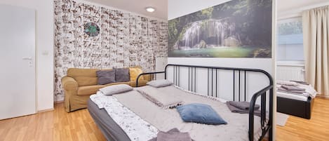 1 chambre, fer et planche Ă repasser, Wi-Fi, draps fournis