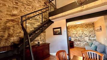 Superior Studio | Living area | 32-inch LCD TV with digital channels, fireplace, Netflix