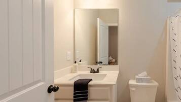 Hair dryer, towels, soap, shampoo