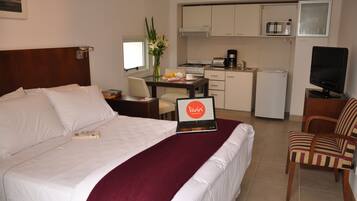 1 chambre, coffres-forts dans les chambres, fer et planche à repasser